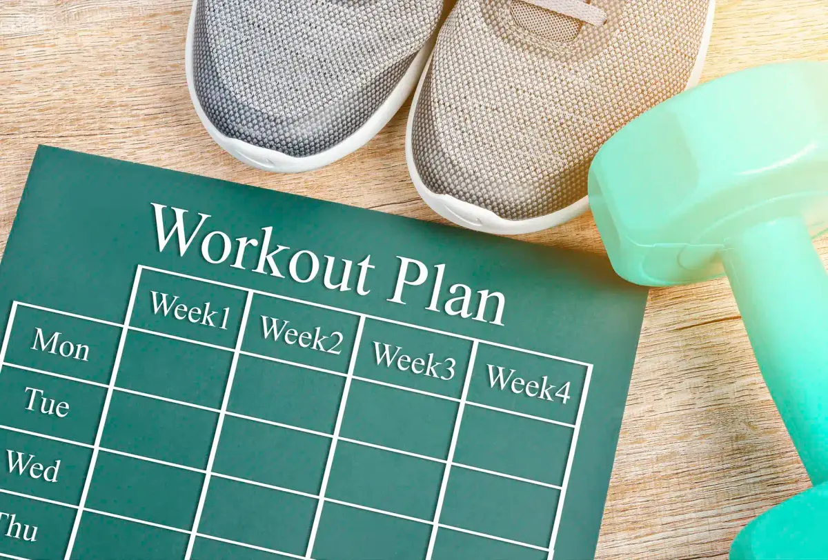planilha de treino semanal com tênis e halter