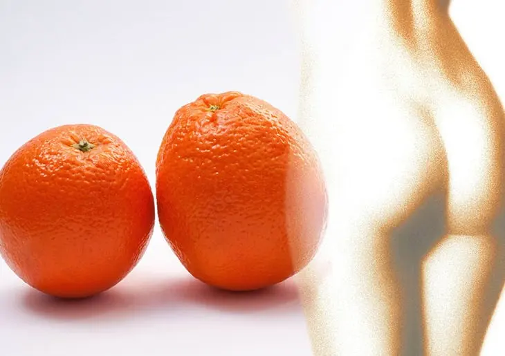 laranjas ao lado de pele com celulite